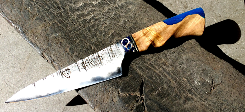 Hand forged kitchen knife uk, Ferraby5” with unique forge marks, sculptured olive handle and resin live edge infill. 