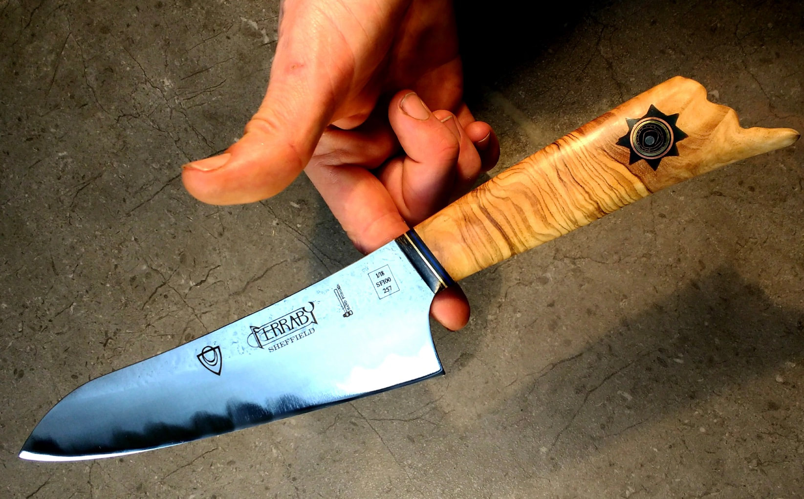 Artisan handmade kitchen knife with olive handle. 